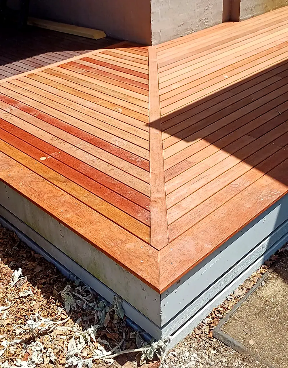 Close-up of diagonal mitred timber decking corner detail
